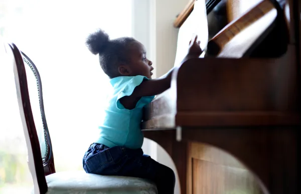 Child playing piano