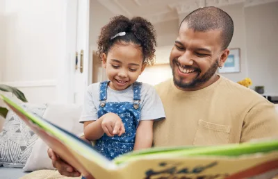 Dad Reading To Child